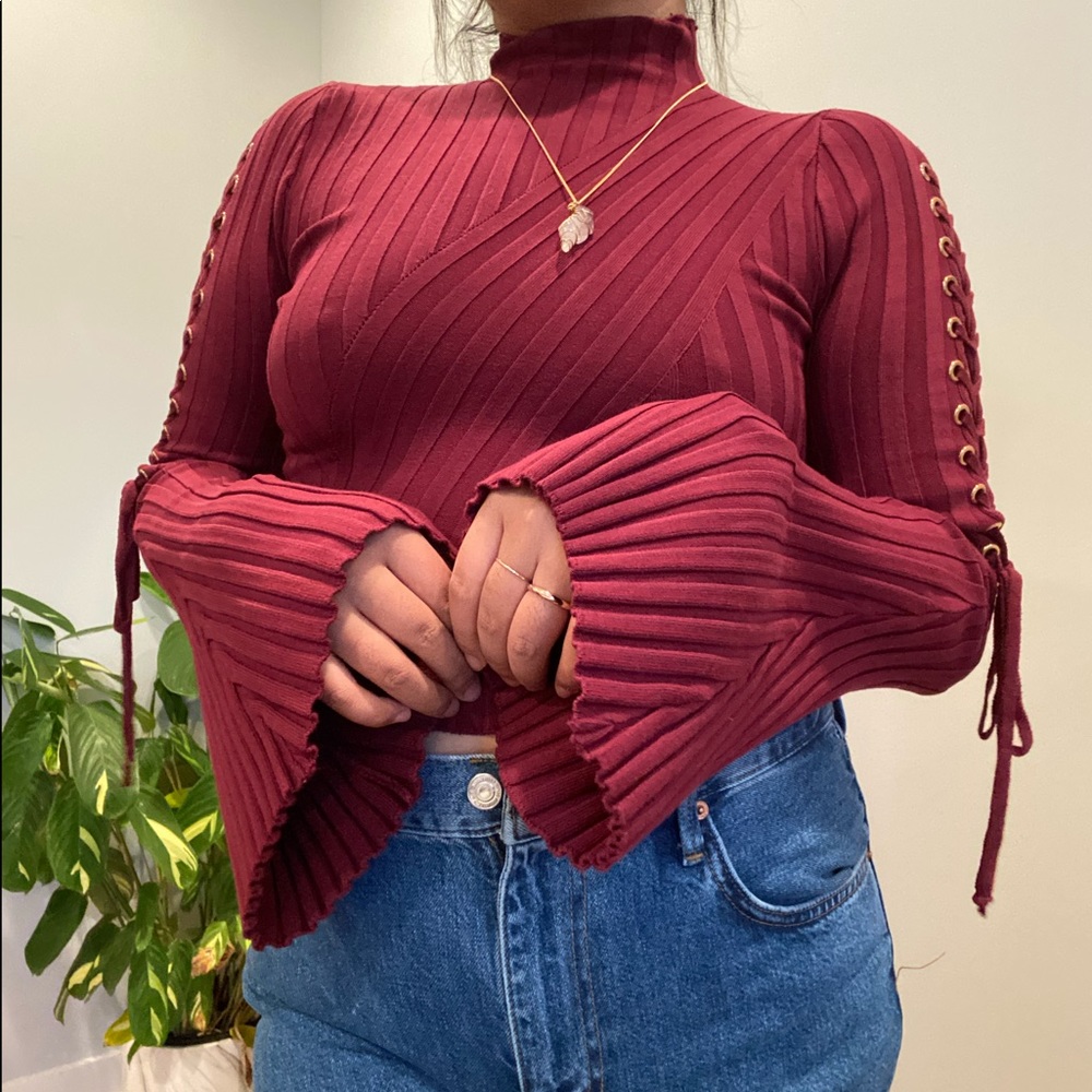 Sweater with corset sleeves